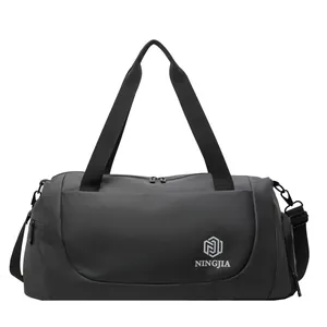 Versatile large capacity black duffel bag for short travel and business trips