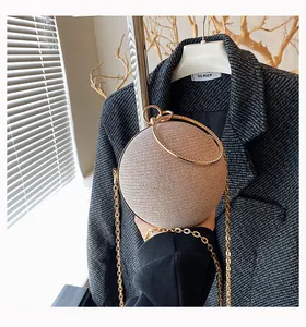 Elegant champagne gold spherical evening clutch bag with diamond rhinestones