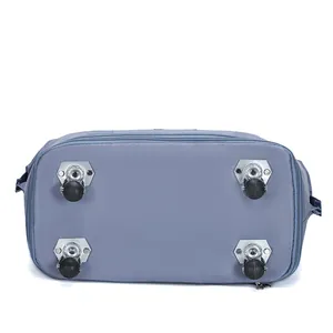 Bottom view of foldable travel bag with four durable swivel wheels and water-repellent fabric