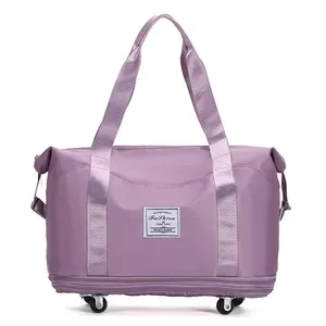 Purple large capacity foldable travel bag with universal wheels and waterproof nylon