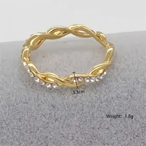 Elegant 18k gold plated twisted ring with sparkling rhinestone inlay for women fashion