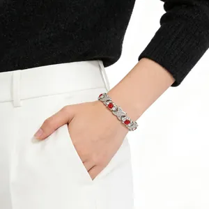 Adjustable elegant silver leaf magnet bracelet with red crystals and rhinestones