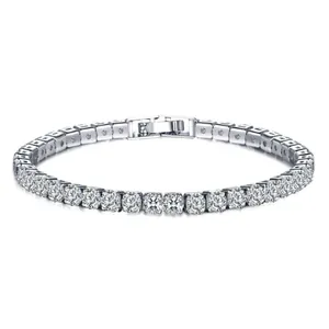 Detailed macro view of a silver tennis bracelet featuring sparkling round cubic zirconia stones