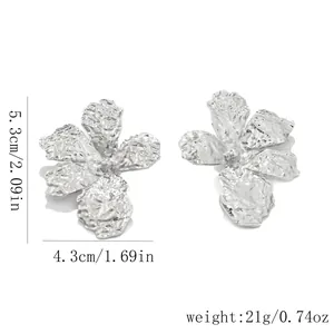 Silver textured metal flower stud earrings showing product size and weight specifications