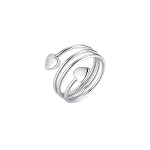 Minimalistische zilveren magnetische hartring met een verstelbaar spiraalontwerp.