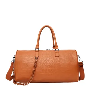 Large capacity orange crocodile texture travel bag with handles and shoulder strap