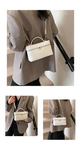 Elegant white crocodile texture box handbag displayed in various angles and poses