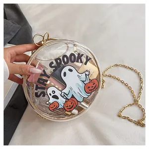 Quirky clear round chain crossbody bag with spooky ghost and pumpkin design print.