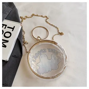 Detail of transparent circular chain bag with ghost design and STAY SPOOKY text