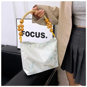 Borsa moderna in stile cinese con eleganti dettagli del manico in perline