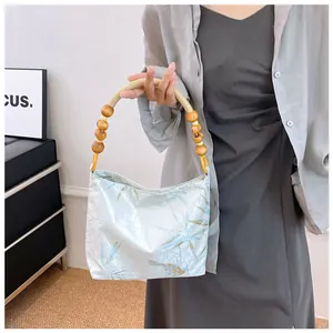 Borsa luccicante in stile neo-cinese con stampa vintage e manico con perline