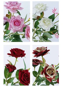 Vista dettagliata di rose finte in velluto a più teste in rosa, bianco e rosso per decoro