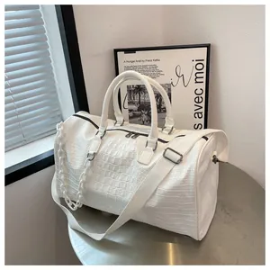 White croc-embossed leather large capacity travel bag with shoulder strap and chain
