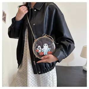 Detailed view of a transparent round Halloween ghost crossbody bag with gold chain