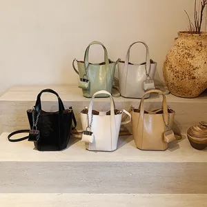 Damen Retro PU Leder Eimertasche Minimalistisch Einfarbig Shopper Mit Mini Anhänger Abnehmbarer Schultergurt Pendeltasche
