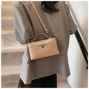 Elegant beige crocodile pattern box bag with adjustable shoulder strap for women