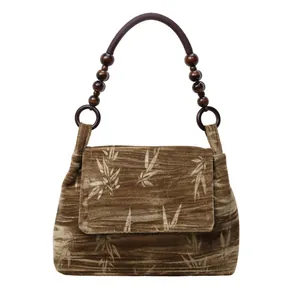 Bolso de hombro de terciopelo estilo chino vintage con estampado de bambú y cuentas.