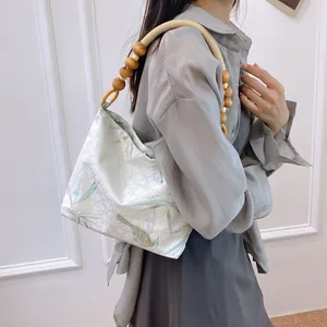Vintage Chinese style handbag with bird print and beaded strap for women