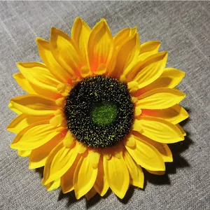 Vibrant yellow simulation sunflower head accessory for outdoor solar landscape lights