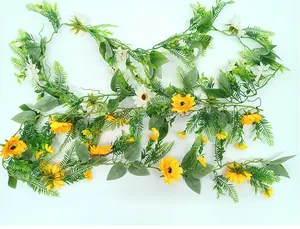 Detailed view of artificial sunflower vine with yellow and white flowers for home decor.