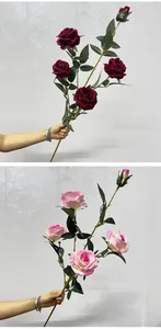 Detailed view of long-stem velvet artificial roses in burgundy and pink colors