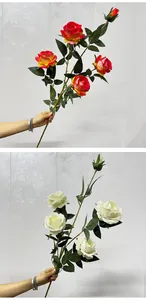 Detail view of 5-head velvet artificial roses in red gradient and ivory white colors