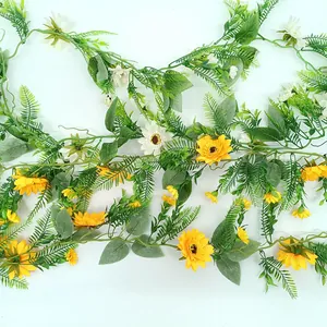 Realistic artificial sunflower vine with yellow flowers for home wall decoration.