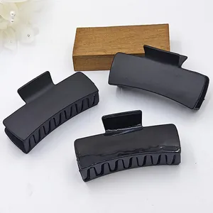 Set of three 11cm black matte and glossy finish square hair claw clips for styling