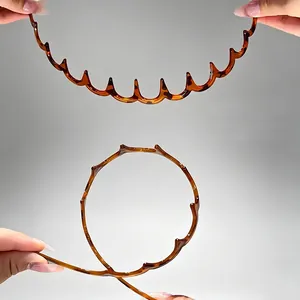 Flexible tortoiseshell wavy headband detail showing high elasticity and durable resin material