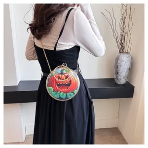 Detailed view of unique round transparent crossbody bag with Halloween pumpkin design