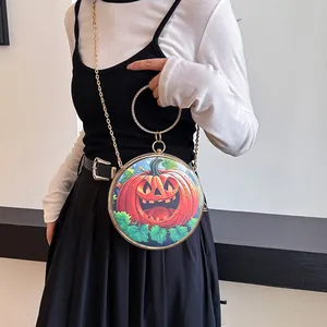 Halloween pumpkin round crossbody bag with rhinestone handle and gold chain strap