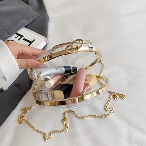 Unique round transparent acrylic clutch bag with elegant gold chain strap for women