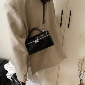 Chic black crocodile embossed box bag for women with top handle and crossbody strap