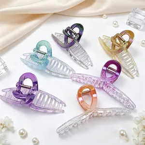 Close-up showing various colors of large 13cm electroplated ribbon hair claw clips