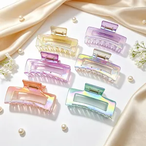 Macro detail of iridescent UV electroplated square hair claw clips in various gradient colors