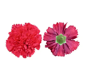 Macro detail view of artificial red carnation flower heads showing front and back
