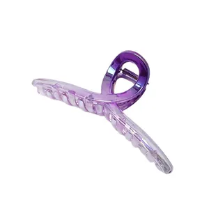 Detail shot of a large purple gradient UV electroplated hair claw clip, 13cm length.