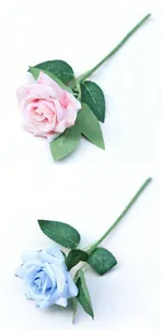 Detailed display of pink and light blue artificial roses with lifelike green leaf textures