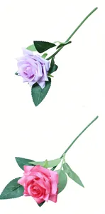 Close-up detail of realistic artificial roses in purple and pink for wedding decor.