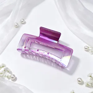 Macro detail showing the purple iridescent UV electroplated square hair claw clip texture