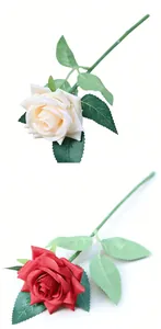 Detail view of lifelike artificial roses in cream and red colors for wedding wall decoration