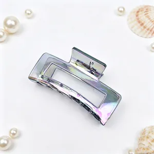 Close-up view showing the iridescent electroplated finish of this square hair claw clip