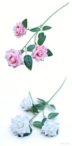 Detailed view of pink and white multi-head artificial roses for wedding decor