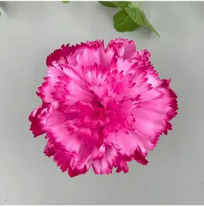 Close-up macro view of artificial pink carnation flower head for DIY wedding decor