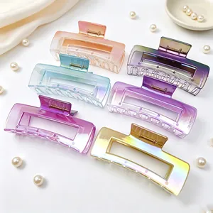Selection of UV plated gradient AB color large square hair claw clips on elegant white silk.