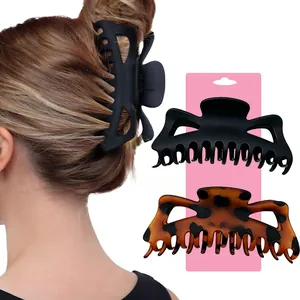 Large matte black and leopard print shark claw clips for thick hair styling back view
