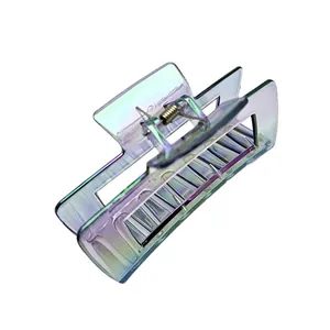 Detailed macro view of a large square iridescent UV electroplated transparent hair claw clip