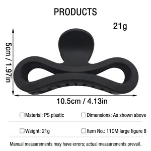 Detailed view of a 10.5cm matte black shark hair claw clip with specific dimensions