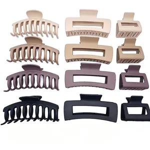Matte finish hair claw clips set in various neutral tones and shapes for versatile styling