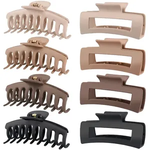 Detailed view of matte frosted hair claw clips in assorted earth tones and two styles.